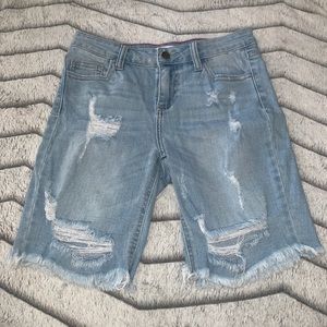 Cut off distressed denim shorts
